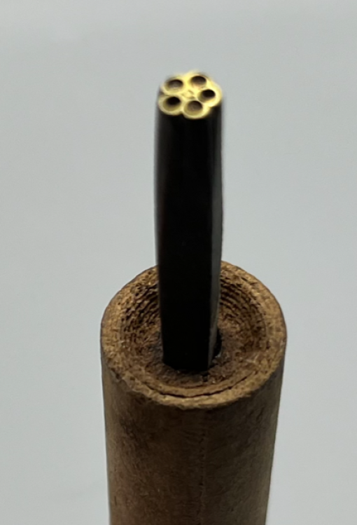 Close up stempel in asbesthandvat